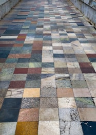 Colorful eco-friendly paver tiles arranged in a garden pathway.