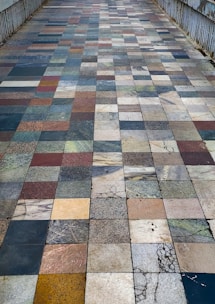 Finished pathway paved with durable, eco-friendly fly ash tiles under sunlight.