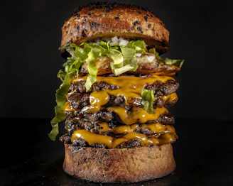 Double cheese smash burger stacked high with two patties and gooey melted cheese.