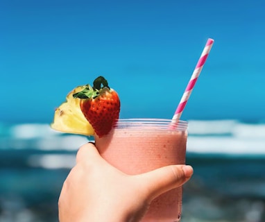 strawberry juice in clear drinking glass