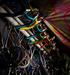 Display of colorful bike accessories and spare parts neatly arranged.