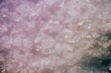 A close-up of a crystal with light refracting through it.