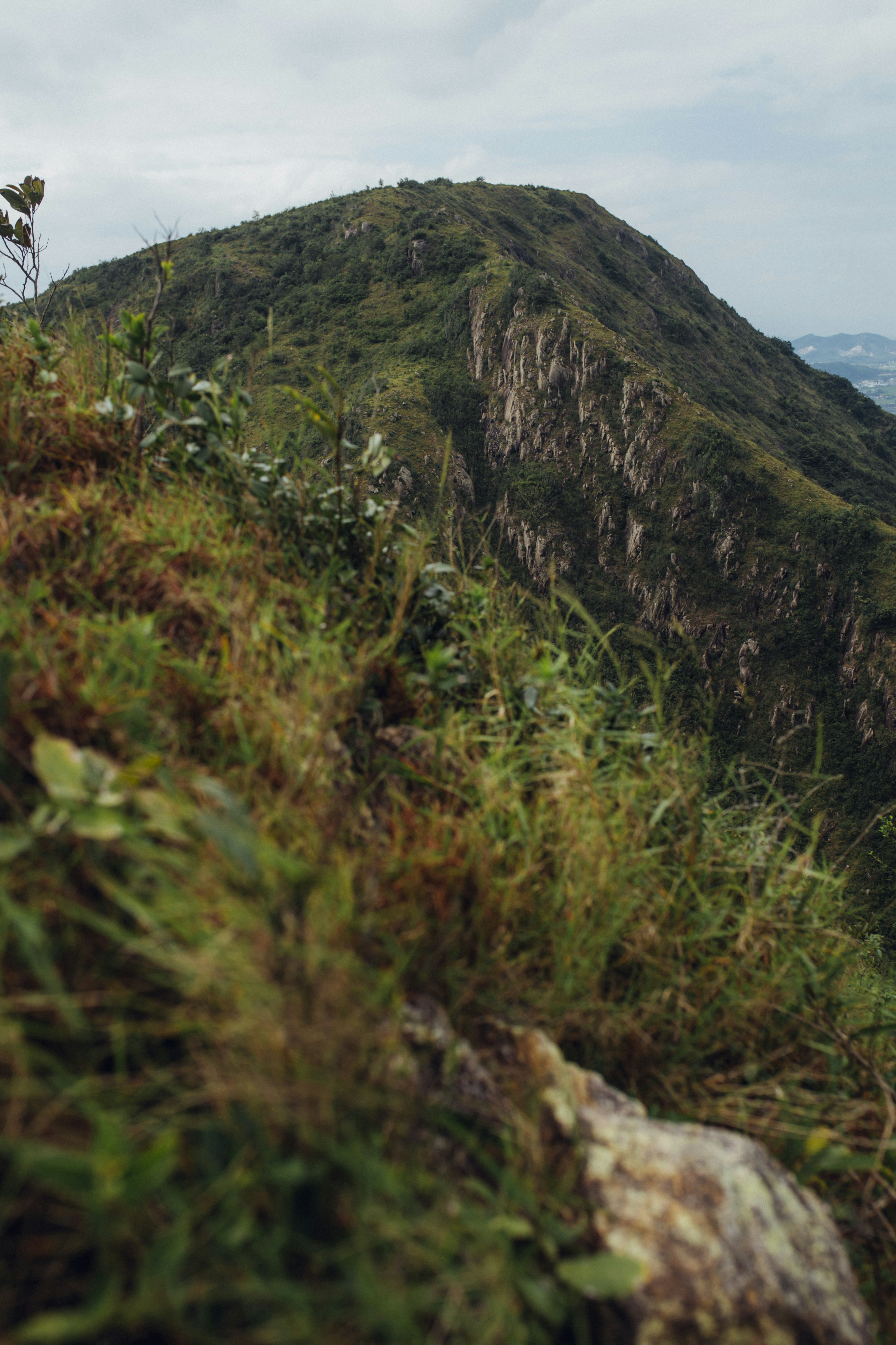 green and brown mountain under blue sky during daytime