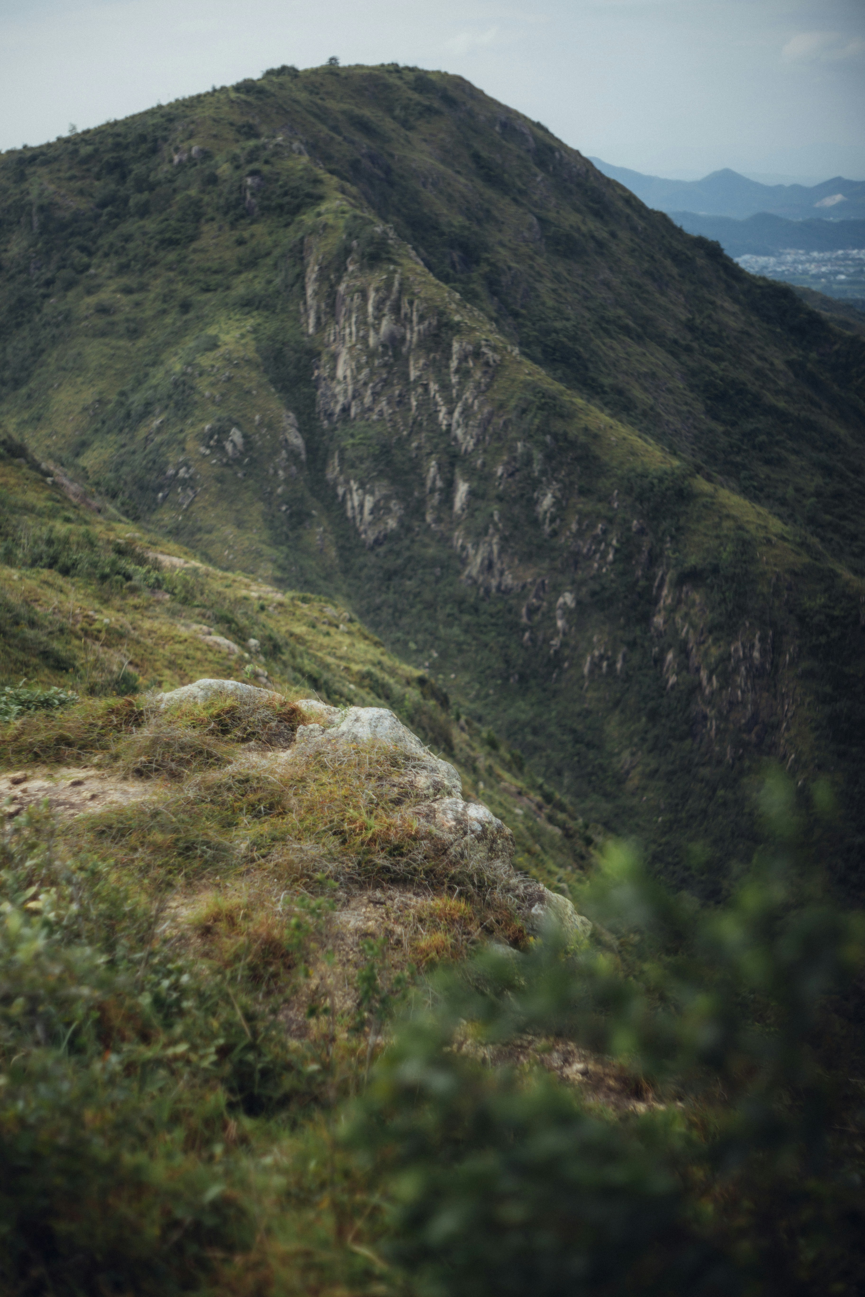 green and brown mountain under blue sky during daytime