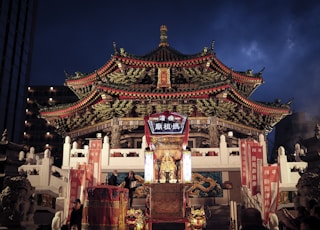 red and brown temple during night time