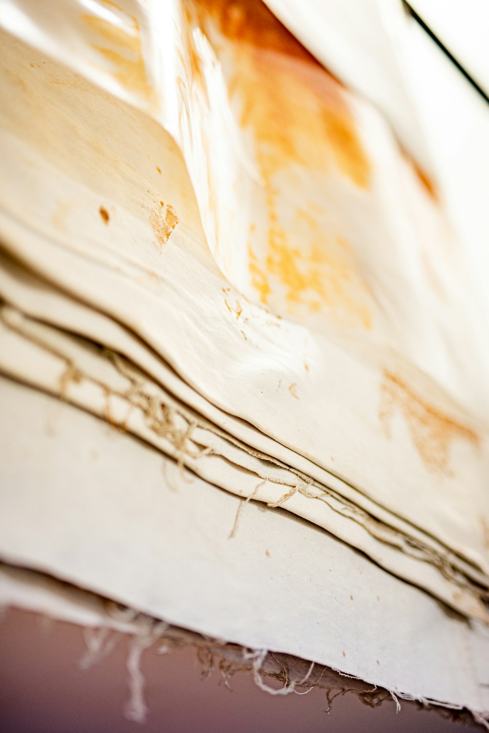 white and brown abstract painting