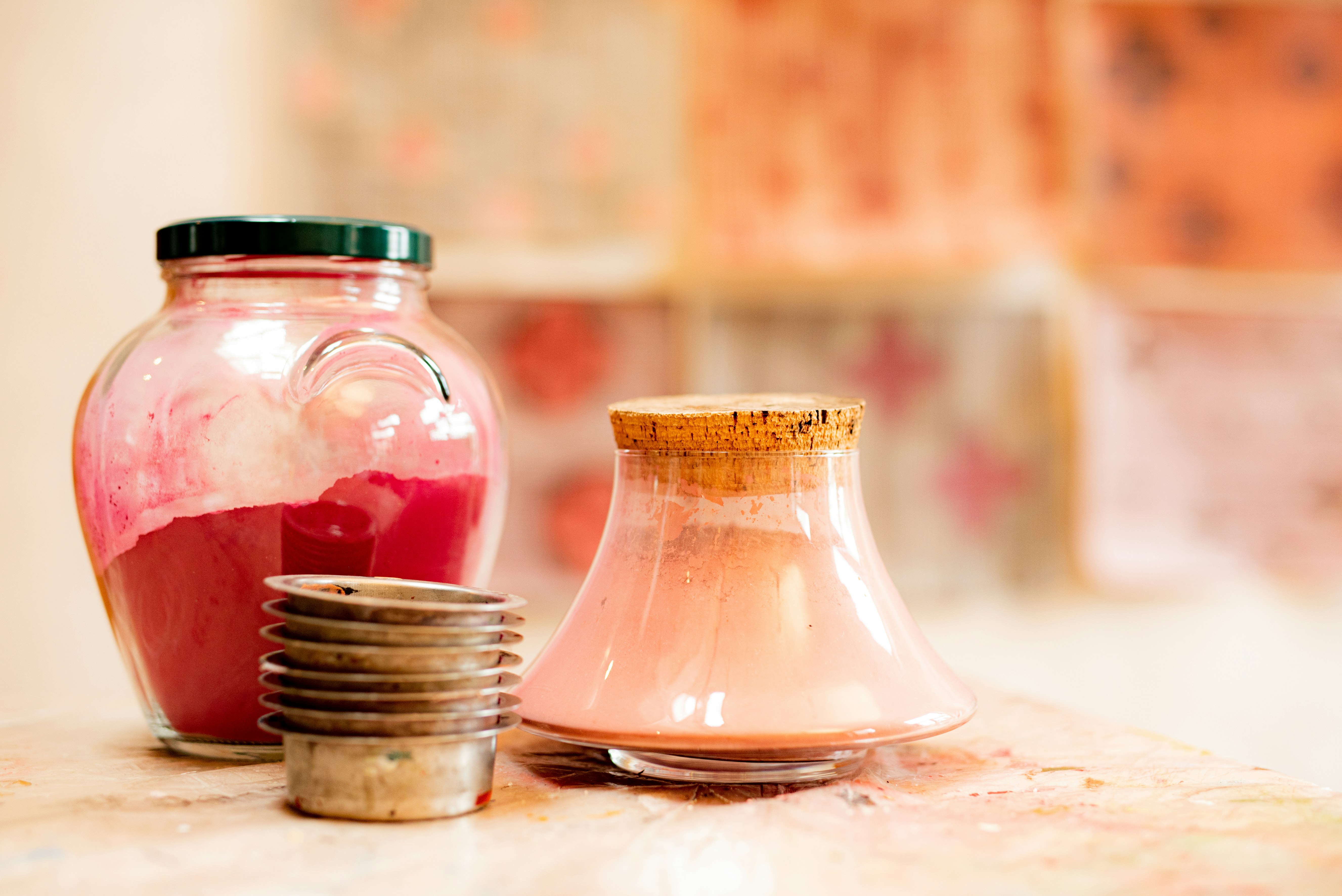 clear glass jar with brown liquid inside