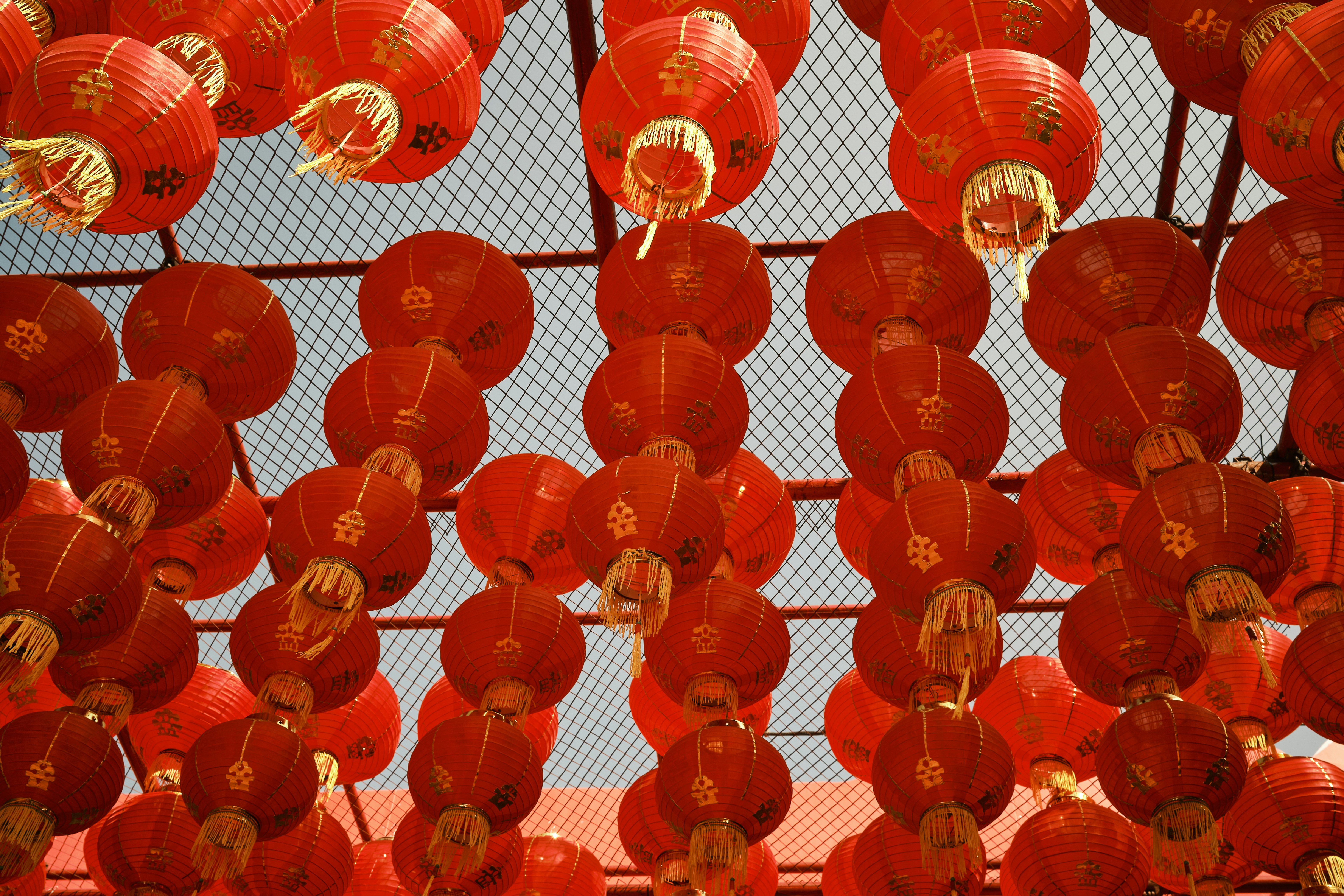 Red lanterns, gold foils, wave patterns, auspicious frame