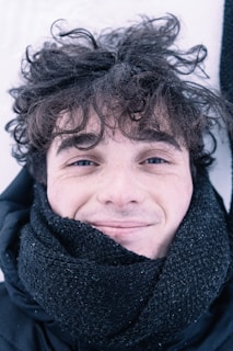 woman in black scarf smiling