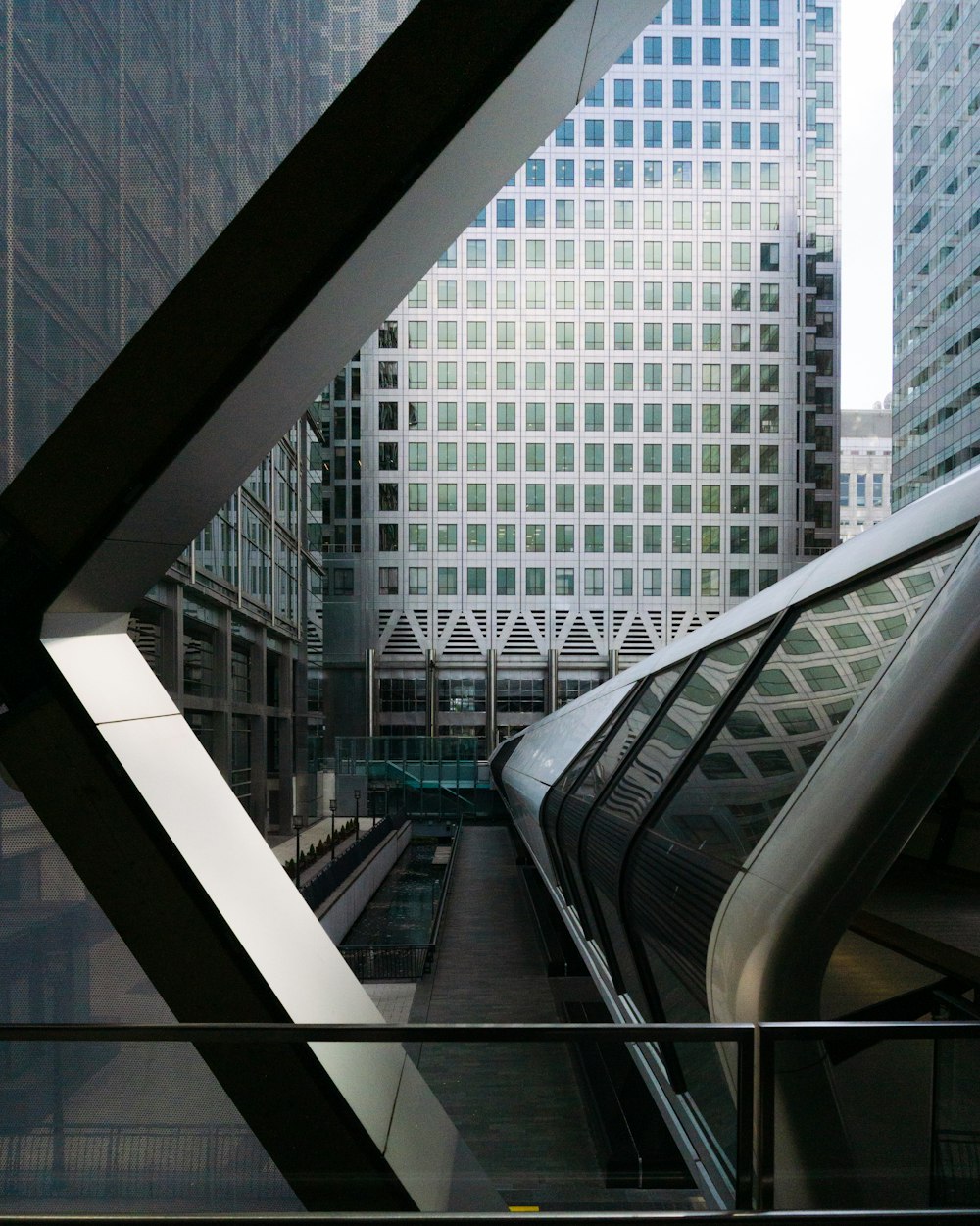 black metal railings near glass window