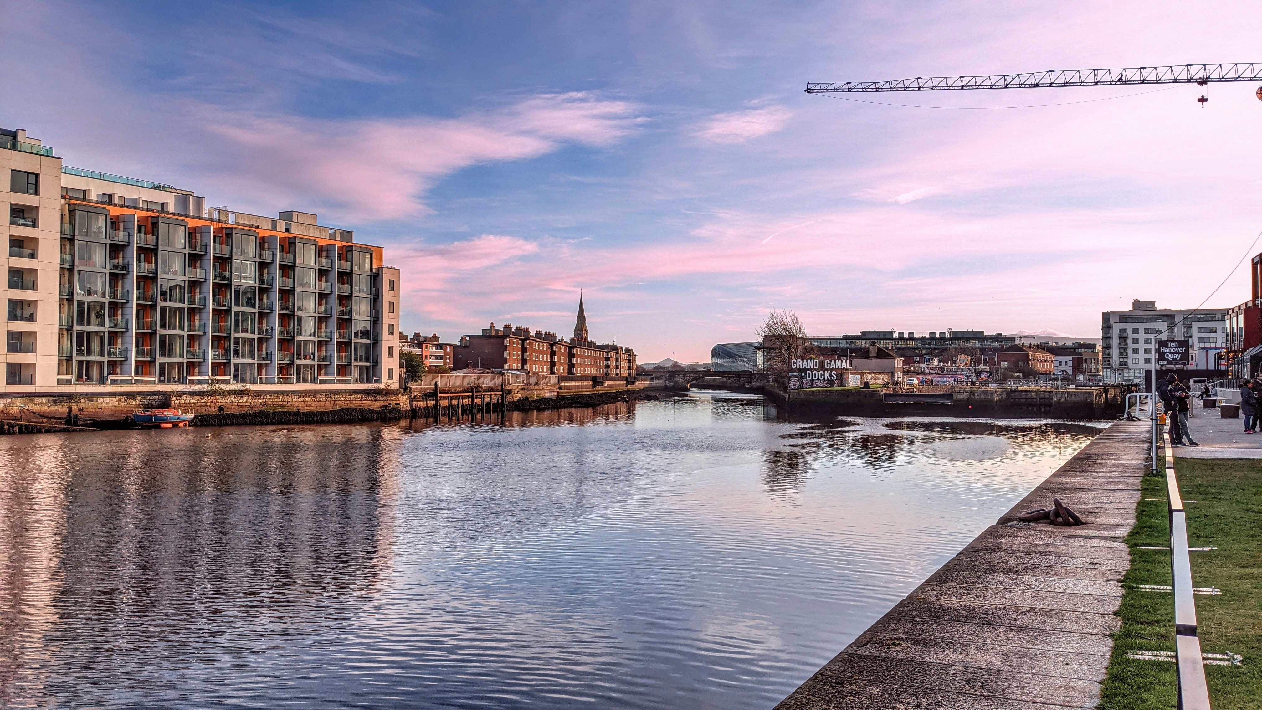 body of water near buildings during daytime