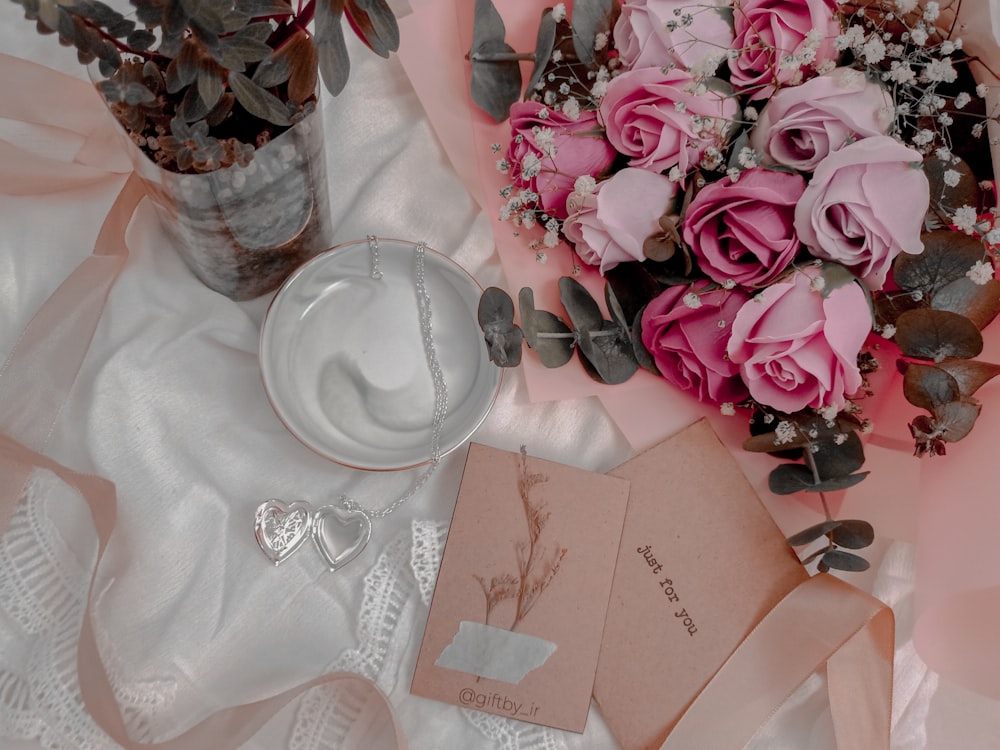 pink roses on white table