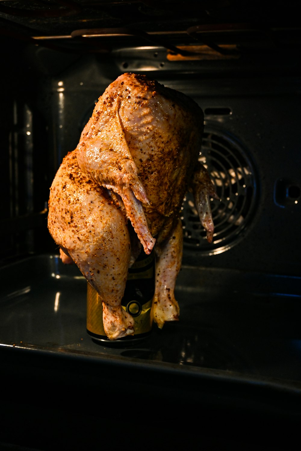 roasted chicken on black induction stove