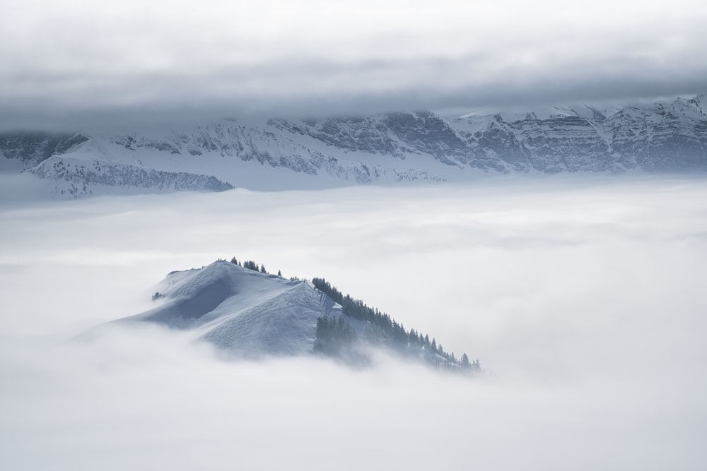 snow covered mountain during daytime