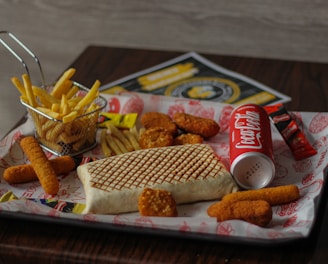 burger and fries on tray