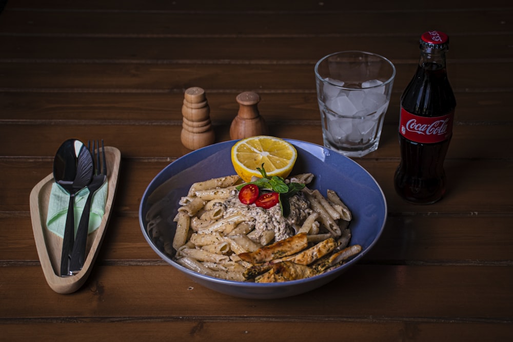 brown ceramic bowl on brown wooden table