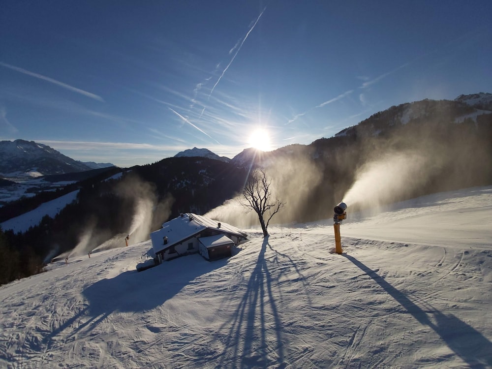 person standing on snow covered ground during daytime