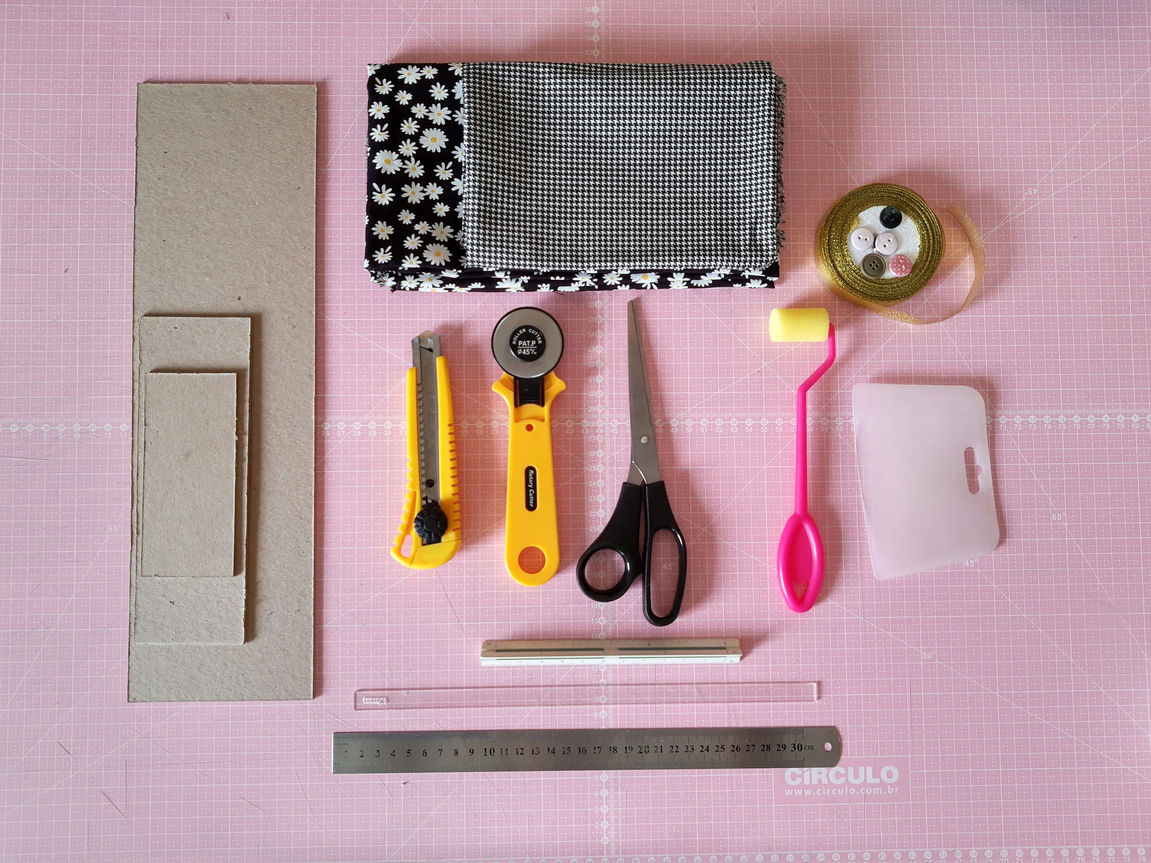 red and yellow scissors beside black and white polka dot print pouch