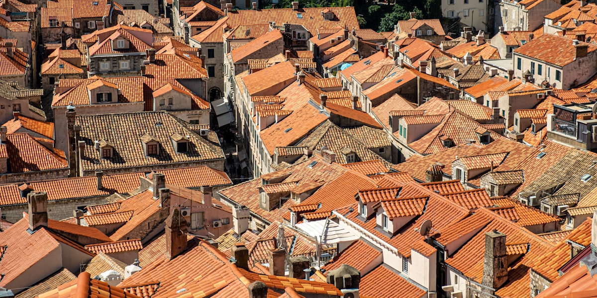 brown and white concrete houses during daytime