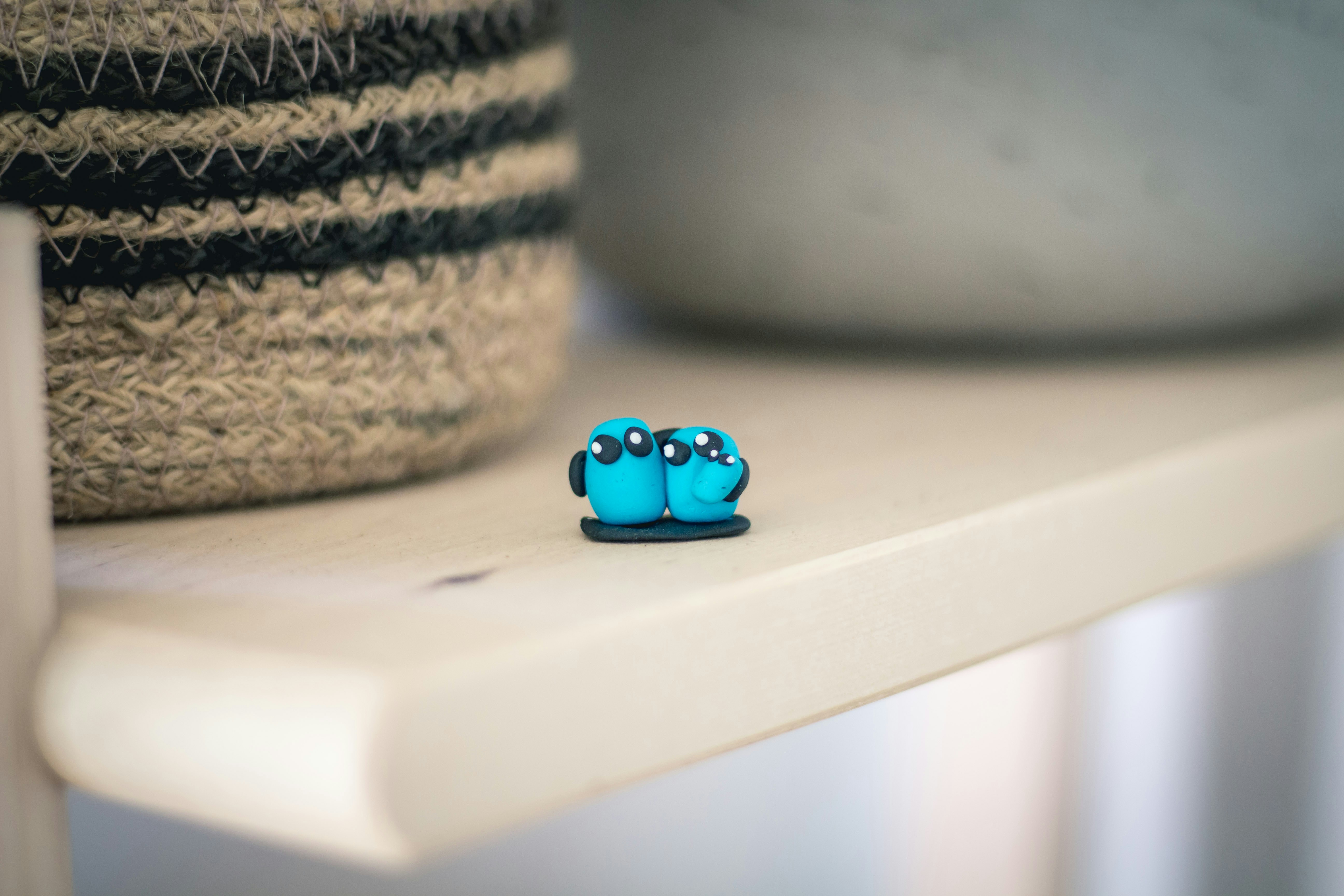 blue and white dice on white table