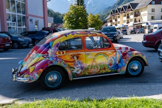 A vibrant vintage Beetle car illustration on a colorful t-shirt.