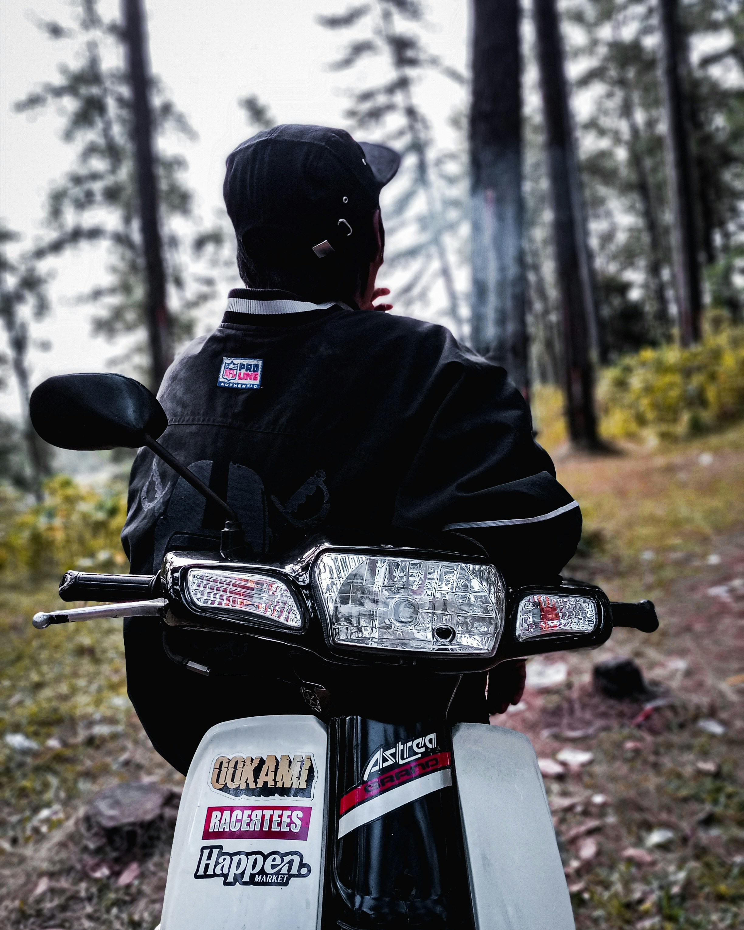 man in black jacket riding on motorcycle
