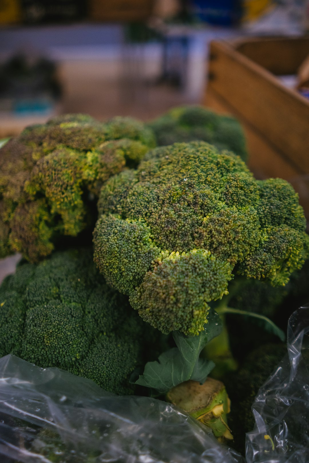 green leafy vegetable on brown wooden table