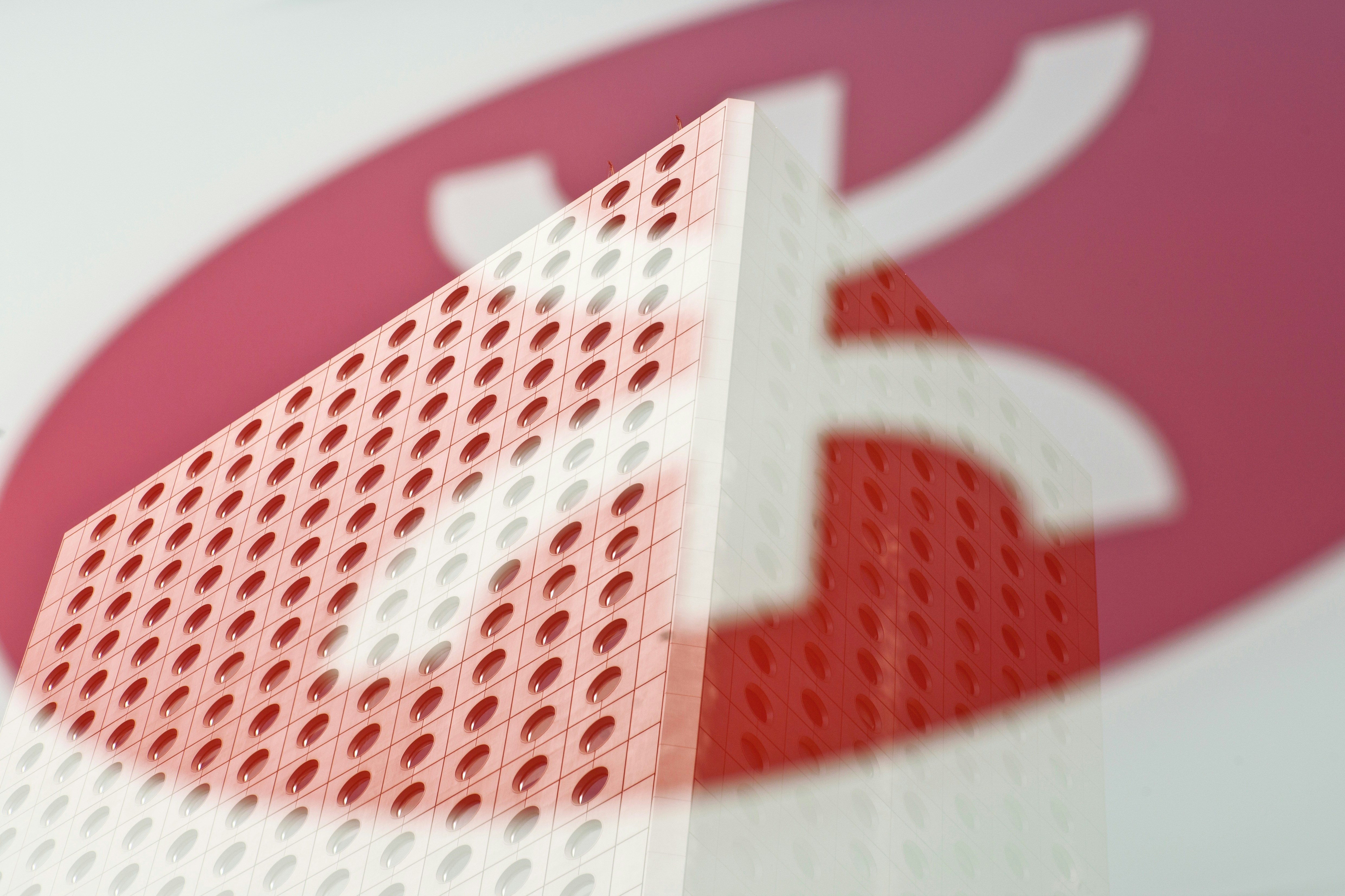 red and white playing cards, Reflection of a Hong Kong office building in a window showing the MTR logo