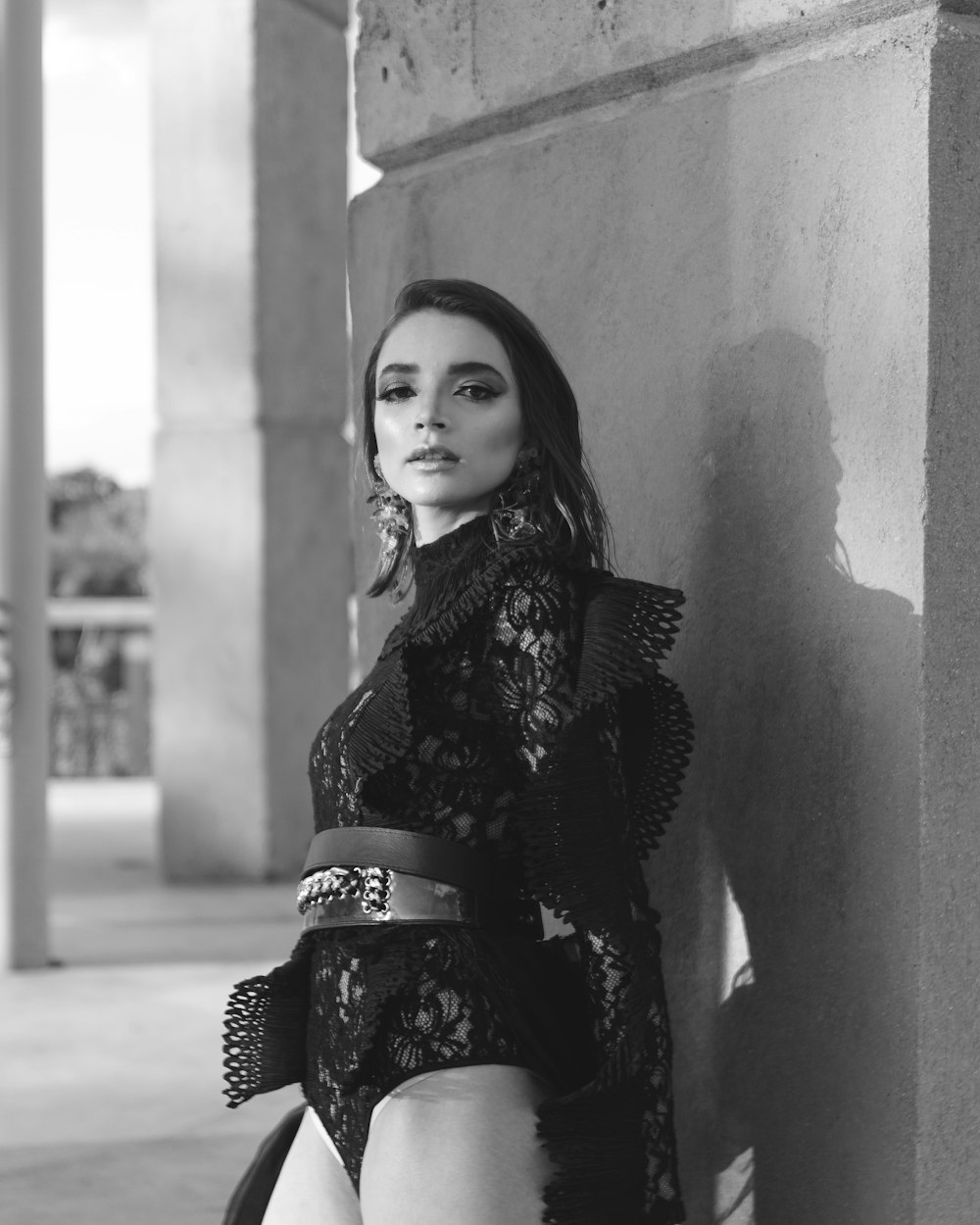 woman in black and white floral dress