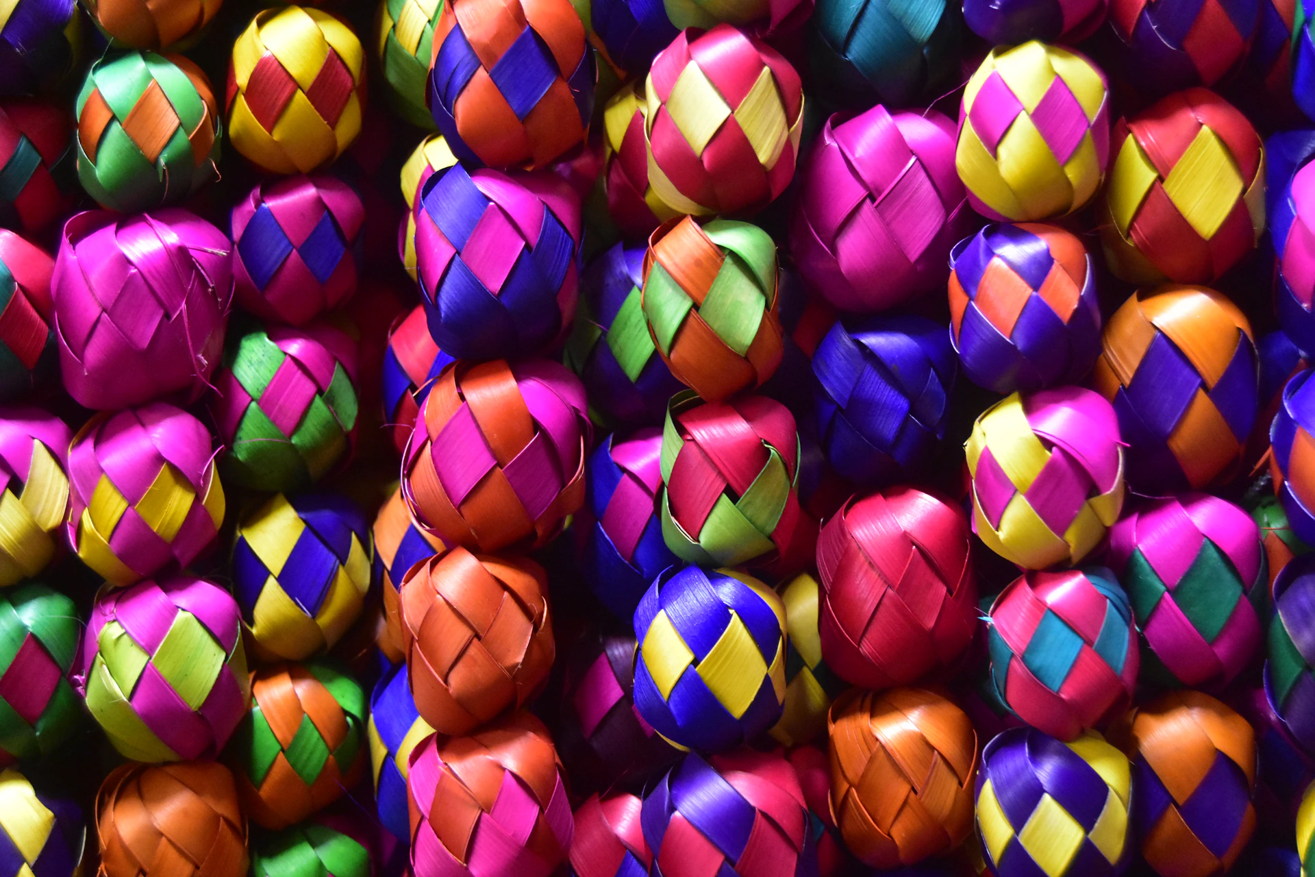 red yellow blue and purple plastic ball toys