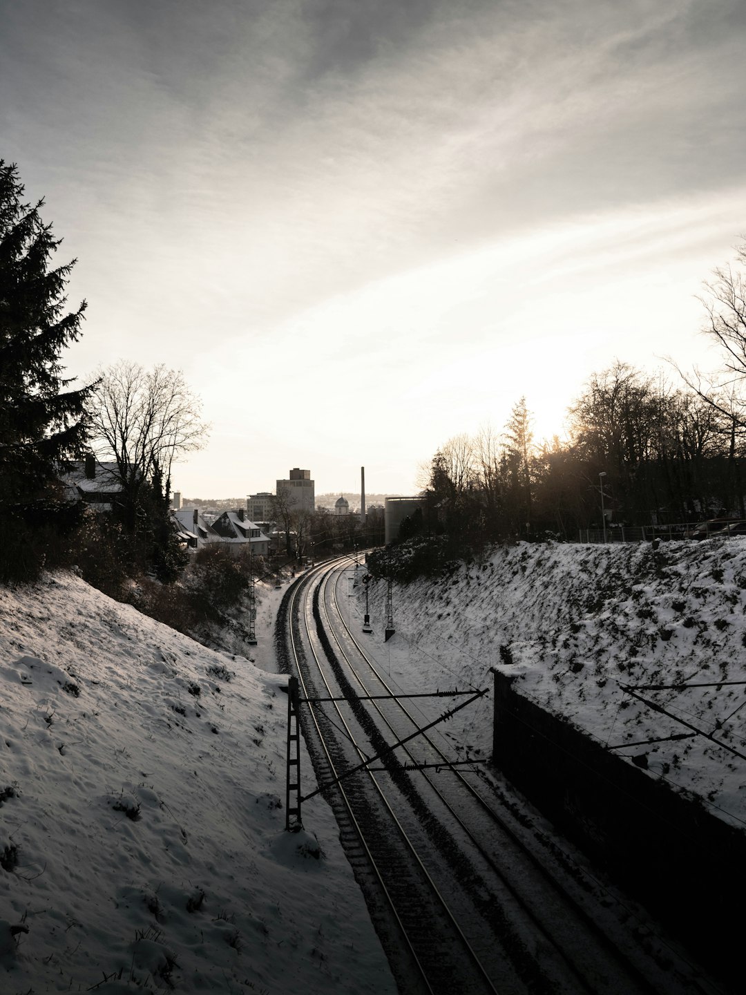 snow covered road during daytime