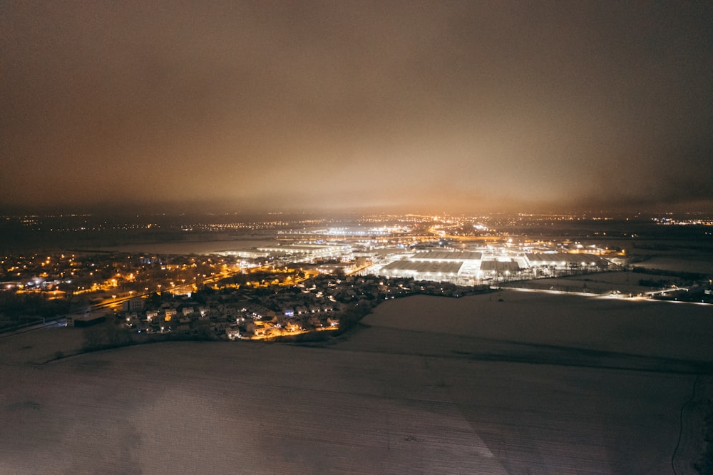 city lights turned on during night time