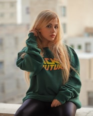 woman in green and yellow hoodie