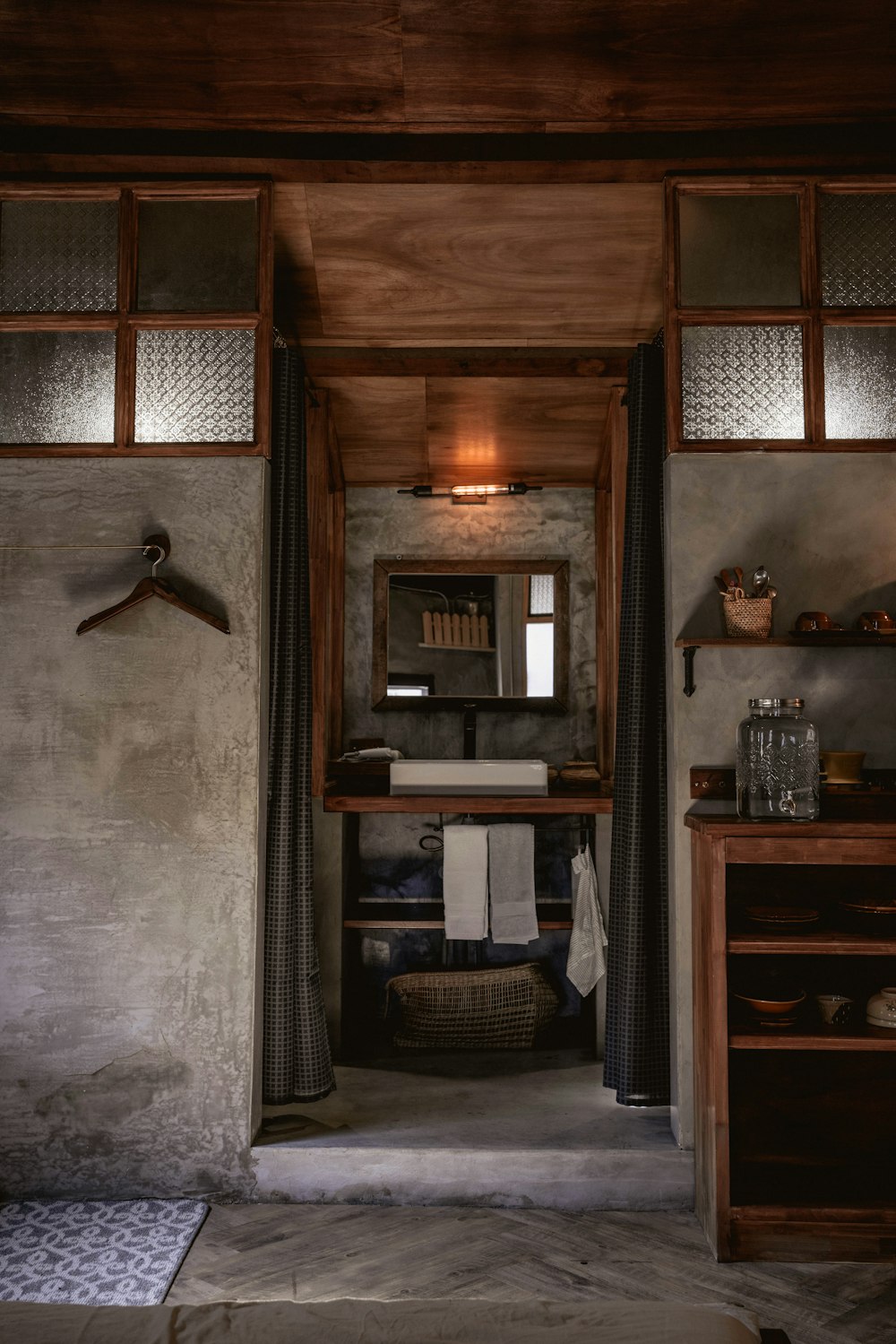 brown wooden cabinet near brown wooden door