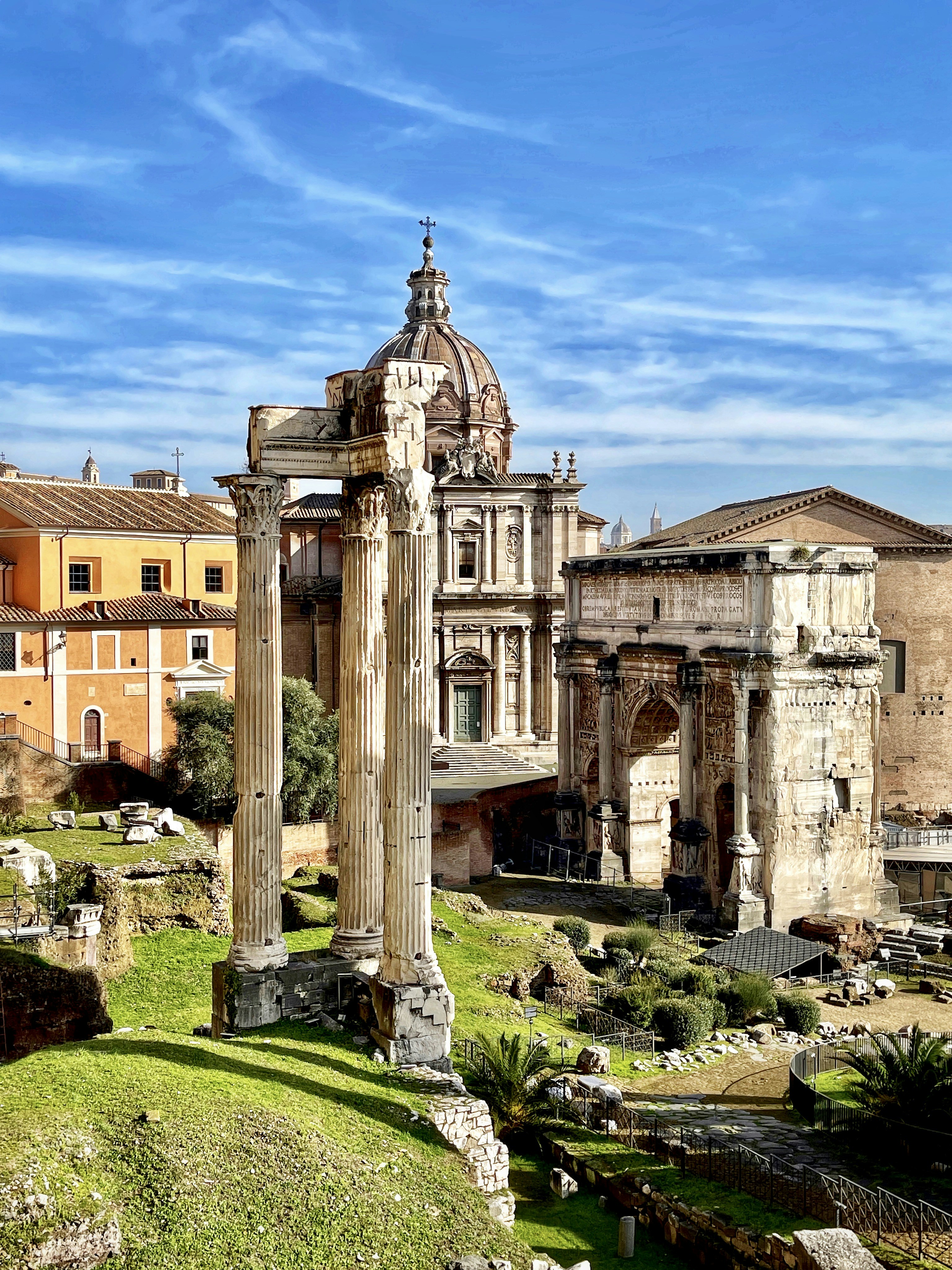 brown concrete building under blue sky during daytime