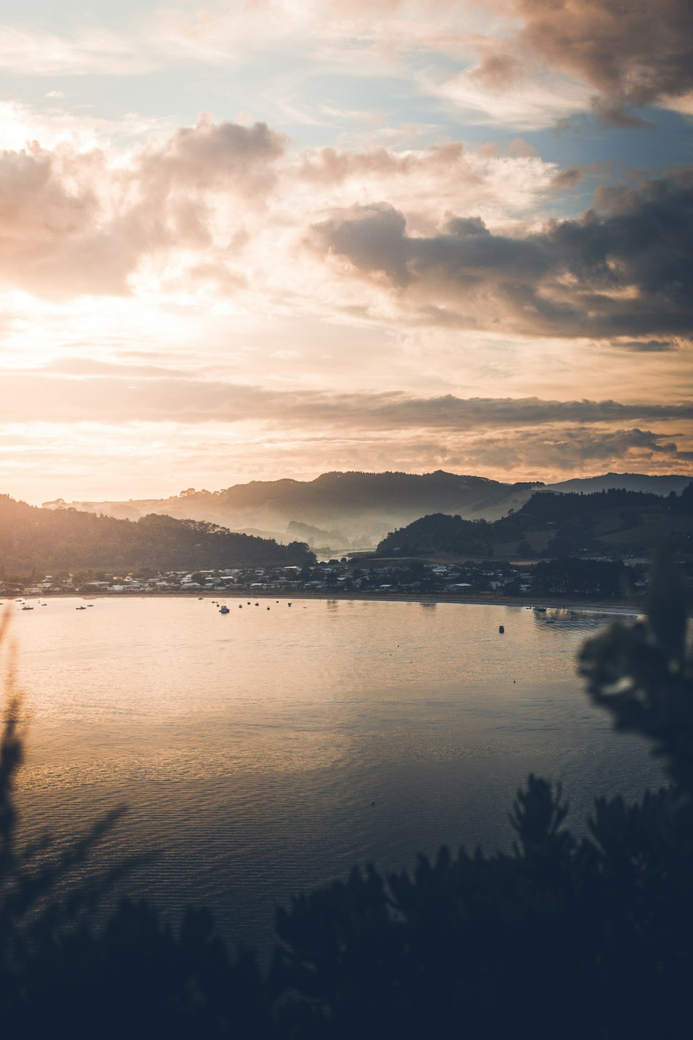 body of water under cloudy sky during daytime