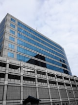 Modern office building with blue accents representing technology and data centers.