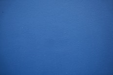 blue painted wall with white paint