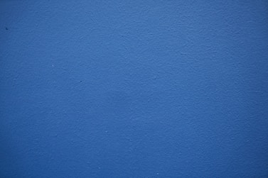 blue painted wall with white paint