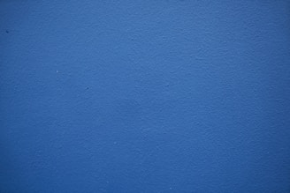 blue painted wall with white paint