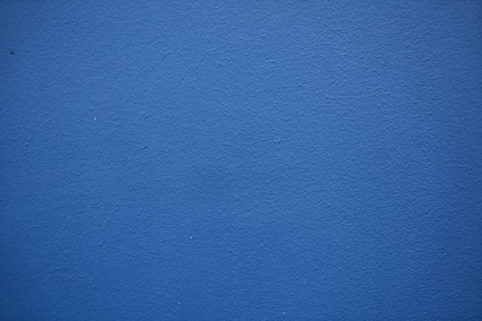 blue painted wall with white paint