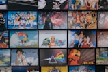 A colorful collage of posters from reviewed movies and anime series.