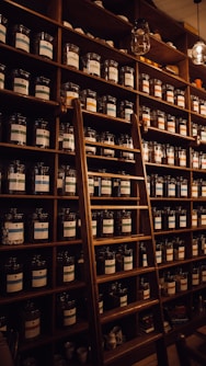 brown wooden shelf with bottles