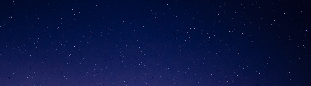 blue sky with stars during night time