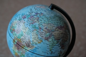 blue and pink desk globe