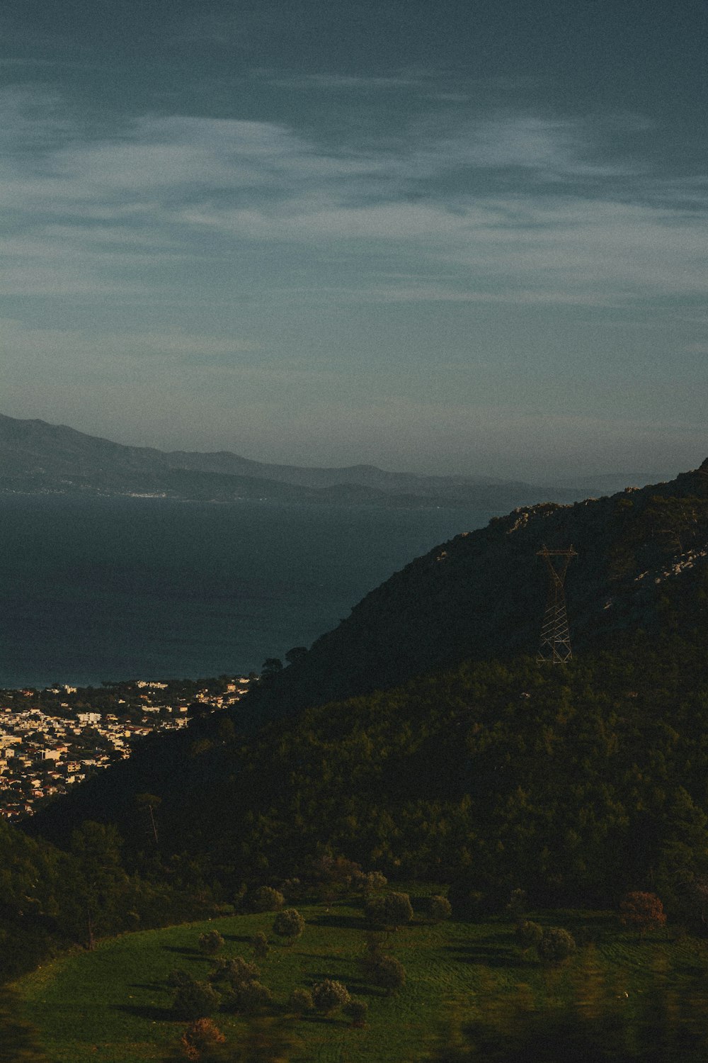 aerial view of city near mountain during daytime