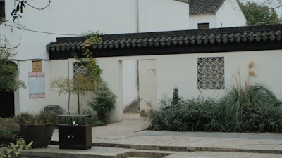 Traditional house with a courtyard and decorative entrance.