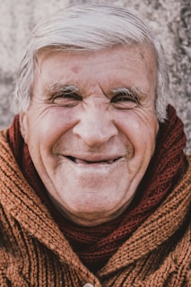 woman in red scarf smiling