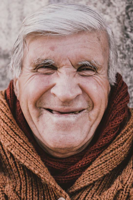 woman in red scarf smiling