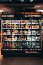 a display case filled with lots of drinks